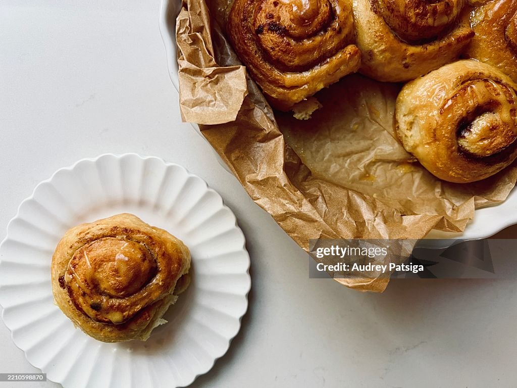 Cinnamon Rolls in Round Dish with Parchment Paper