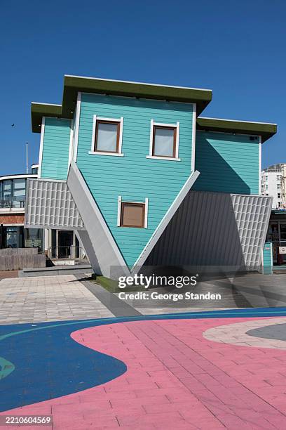 upside house brighton - brighton pier stock pictures, royalty-free photos & images