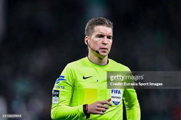 Referee François Letexier looks on during the Ligue 1 McDonald's match between AS Saint-Etienne and Olympique Lyonnais at Stade Geoffroy-Guichard on...