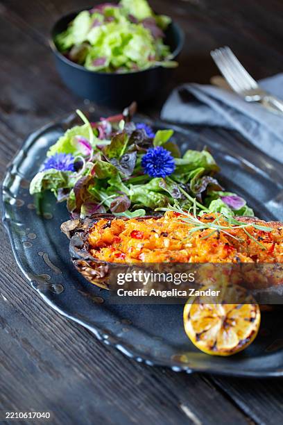 vegetable stuffed eggplant with salad - eggplant flower stock pictures, royalty-free photos & images