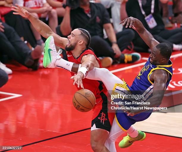Golden State Warriors' Draymond Green fouls Houston Rockets' Dillon Brooks in 3rd quarter during Game 1 of First Round of NBA Playoffs at Toyota...