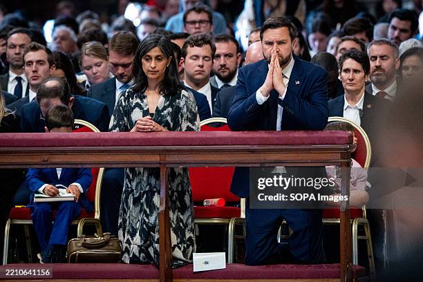 Vice President James David Vance and his wife pray while kneeling at St. Peter's Basilica.