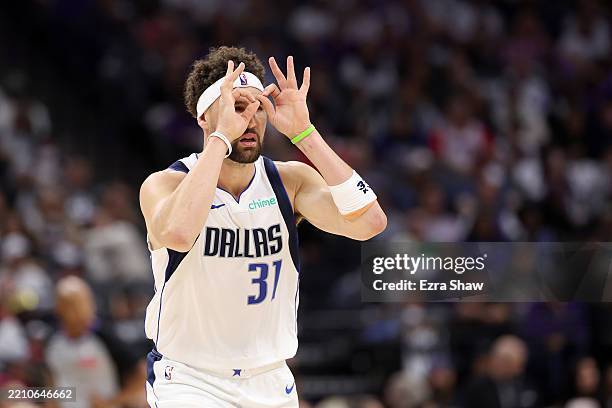 Klay Thompson of the Dallas Mavericks reacts after making a basket against the Sacramento Kings during the first half of the NBA play-in tournament...