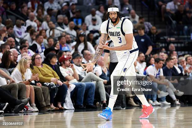 Anthony Davis of the Dallas Mavericks reacts after making a basket against the Sacramento Kings during the first half of the NBA play-in tournament...