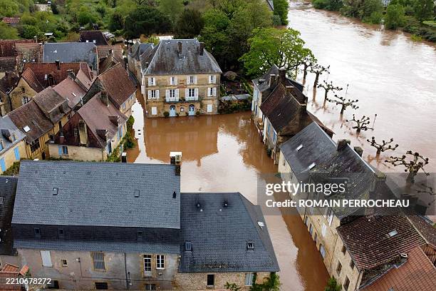 This aerial photograph shows a view of flooded streets following the overflowing of "la Vezere" river in Montignac-Lascaux, south-western France, on...