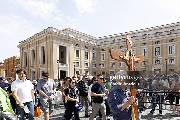 Pilgrims make their way to St. Peter's Square, after the news of Pope Francis' death spread, on April 21 Vatican City, Vatican. Pope Francis died at...
