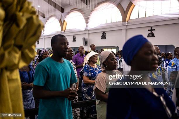 Catholics gather for a mass at the Church of the Assumption in Lagos on April 21, 2025. African leaders praised the "legacy of compassion" and...