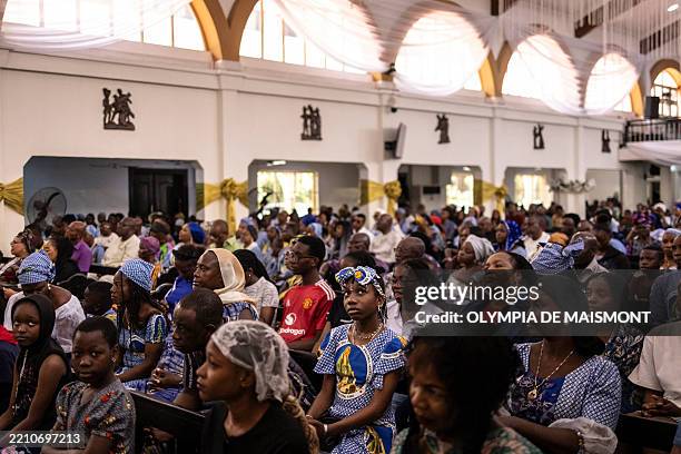 Catholics gather for a mass at the Church of the Assumption in Lagos on April 21, 2025. African leaders praised the "legacy of compassion" and...