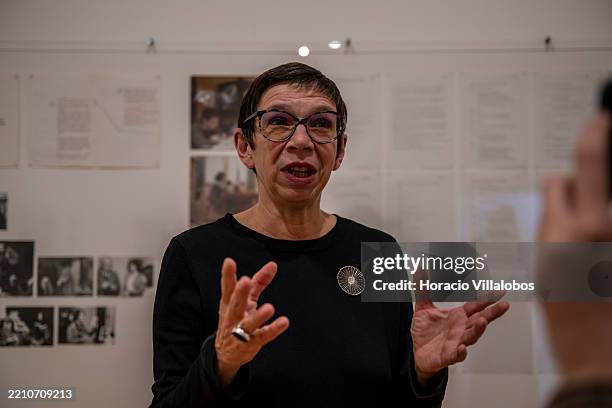 Exhibition curator Laurence Rassel talks to journalists during a press visit to experimental film pioneer Chantal Akerman "Travelling" Exhibition at...