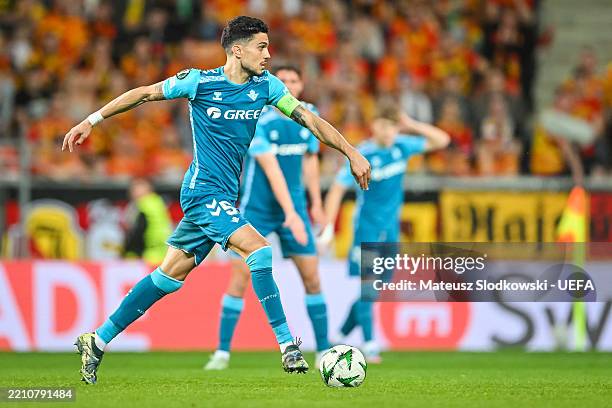 Marc Bartra of Real Betis Balompie controls the ball during the UEFA Conference League 2024/25 Quarter Final Second Leg match between Jagiellonia...
