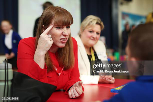 Angela Rayner, Deputy Prime Minister of the United Kingdom, talks with young pupils as she visits Palace Fields Primary School with Karen Shore,...