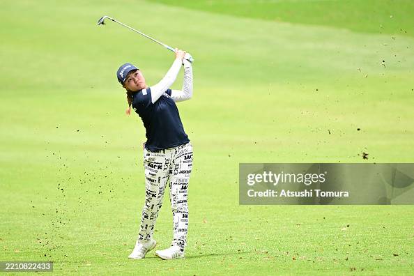 Amateur Sakura Torii of Japan hits her third shot on the 4th hole