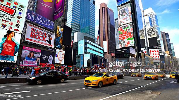 day. times square. yellow taxi - yellow taxi stock pictures, royalty-free photos & images