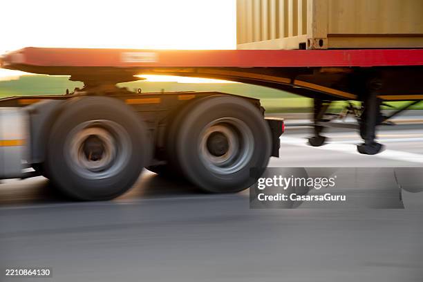 truck wheels in motion blur - selective focus - car tire side view stock pictures, royalty-free photos & images