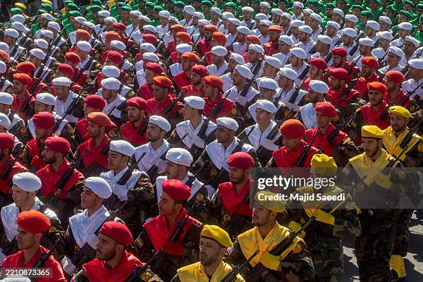 Soldiers from Iran's land, navy, air force and special forces parade on the occasion of National Army Day on April 18, 2025 in Tehran, Iran. The...