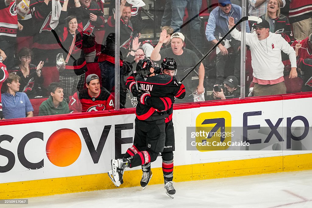 Jordan Martinook of the Carolina Hurricanes celebrates his second