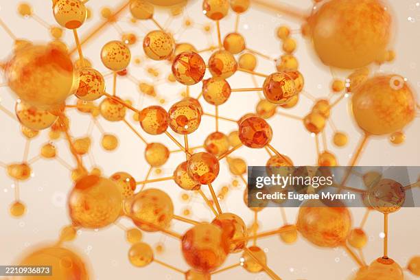 orange molecules forming complex structure are creating innovative cosmetic solution - nanotechnologie stockfoto's en -beelden