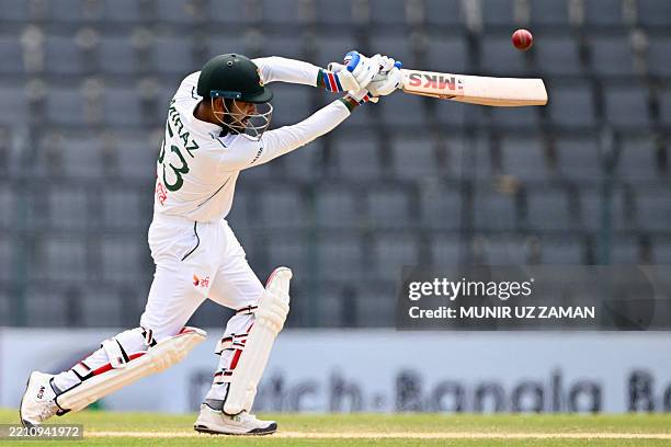 Bangladesh's Mehidy Hasan Miraz plays a shot during the fourth day of the first Test cricket match between Bangladesh and Zimbabwe at the Sylhet...