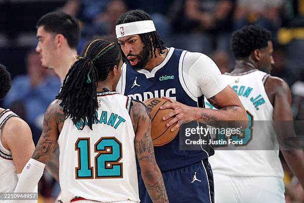Anthony Davis of the Dallas Mavericks and Ja Morant of the Memphis Grizzlies react during the first half of the Play-In Tournament at FedExForum on...