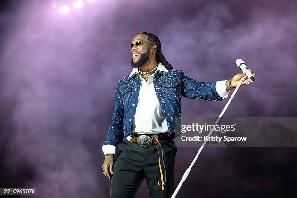 Burna Boy performs live on stage at Stade de France on April 18, 2025 in Paris, France.