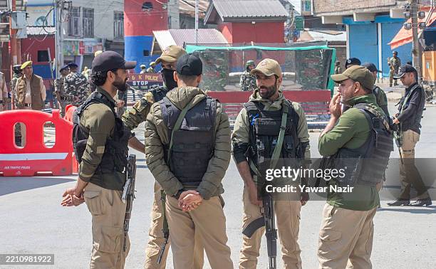 Indian government forces stand guard, following an attack on Indian tourists by gunmen on April 23, 2025 in Srinagar, India. At least 24 tourists...