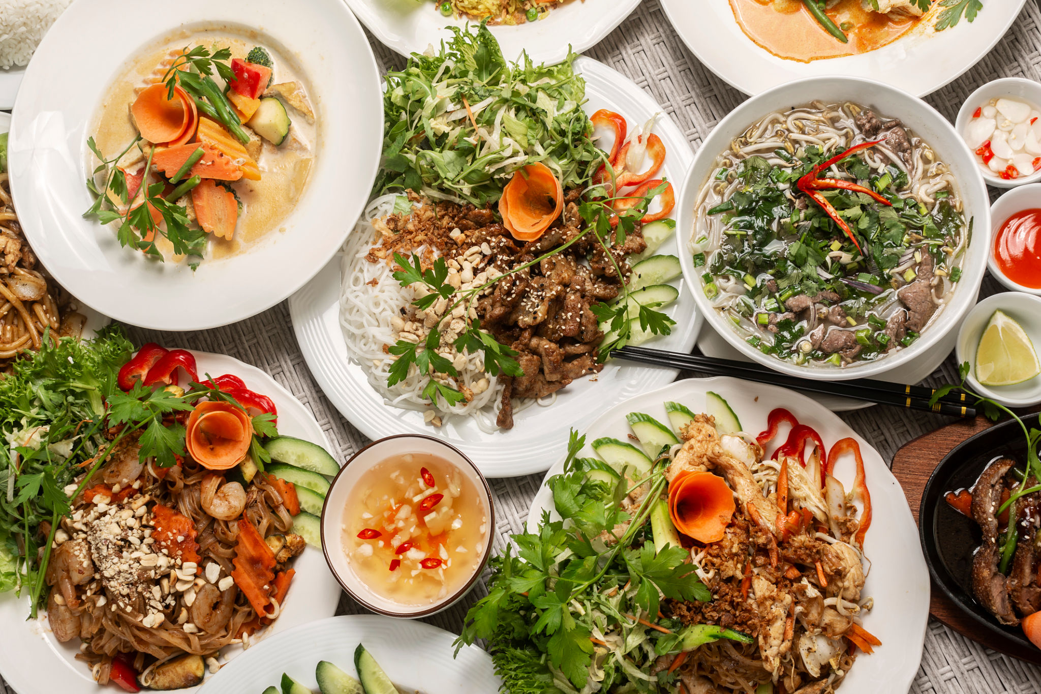 assortment of mixed traditional vietnamese food dishes on buffet table assortment of mixed traditional vietnamese food dishes on buffet table