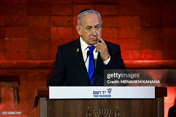 Israeli Prime Minister Benjamin Netanyahu speaks during a ceremony marking Yom HaShoah, Holocaust Remembrance Day, for the six million Jews killed...