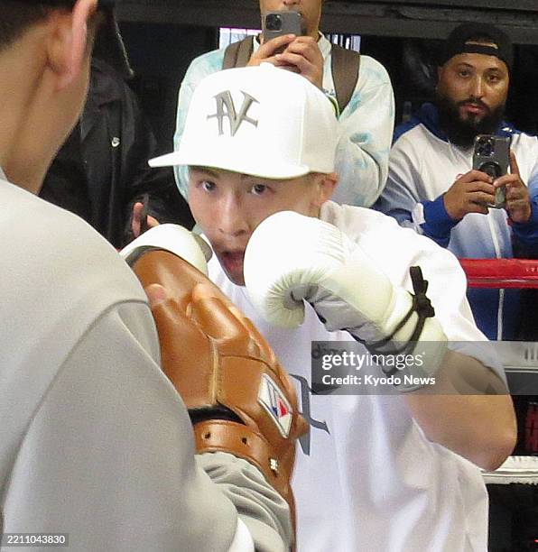 Undisputed super bantamweight boxing champion Naoya Inoue of Japan takes part in an open training session in front of the media at a gym in Los...