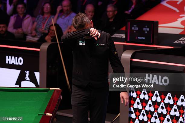 Kyren Wilson of England reacts against Lei Peifan of China during the first round match on day one of the Halo World Snooker Championship 2025 at...