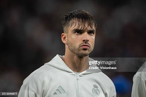 Raul Asencio of Real Madrid looks on prior to the UEFA Champions League 2024/25 Quarter Final Second Leg match between Real Madrid C.F. And Arsenal...