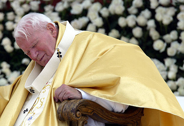 Pope John Paul II prays during a mass for the canonization of Pedro De San Jose de Betancourt, a 17th-century Spanish missionary who dedicated his...