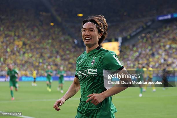 Ko Itakura of Borussia Moenchengladbach celebrates scoring his team's first goal during the Bundesliga match between Borussia Dortmund and Borussia...