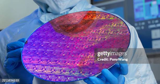 technician with wafer - wafer stock pictures, royalty-free photos & images
