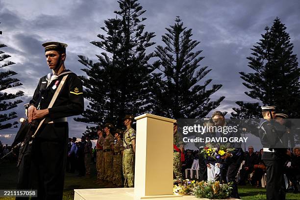 Officials lay a wreath during the annual ANZAC Day dawn service at Coogee Beach in Sydney on April 25, 2025. Dawn services were held across the two...