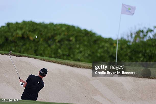 Andrew Putnam of the United States hits out of a bunker on the 17th hole during the final round of the Corales Puntacana Championship 2025 at...