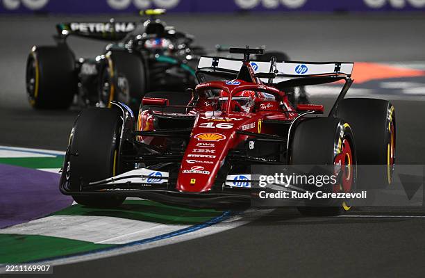 Charles Leclerc of Monaco driving the Scuderia Ferrari SF-25 leads Andrea Kimi Antonelli of Italy driving the Mercedes AMG Petronas F1 Team W16 on...