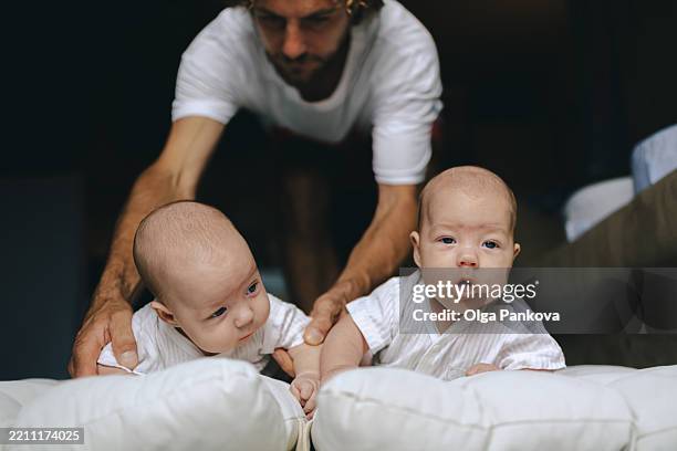 Twins Doing Math 156 Identical Twins In Bed Stock Photos, High-Res Pictures, and Images ...