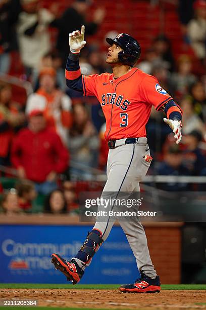 Jeremy Pena of the Houston Astros celebrates at home plate after hitting a three-run home run in the ninth inning during a game against the St. Louis...