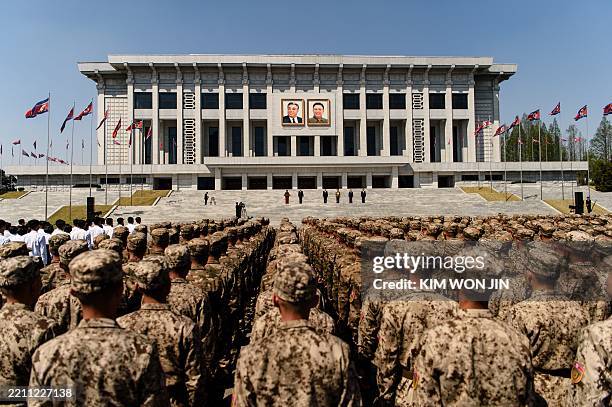 Korean People's Army soldiers participate in a commemorative march in the plaza of the April 25 House of Culture in Pyongyang on April 25 to mark the...