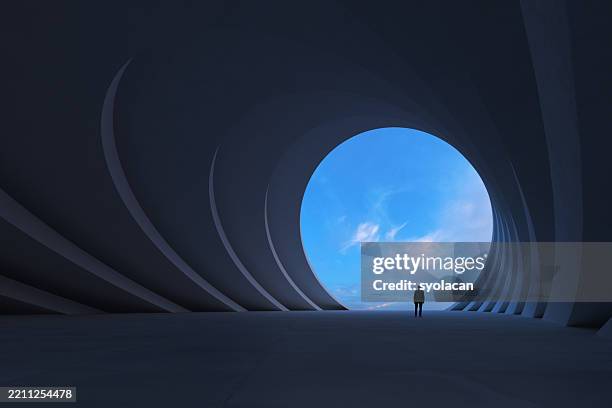 luz al final del túnel - conceptos fotografías e imágenes de stock