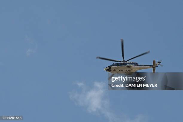 An AW 139 Italian police helicopter flies over Rome, a day prior to the Pope's funeral, on April 25, 2025. The Vatican on April 25 said 150,000...
