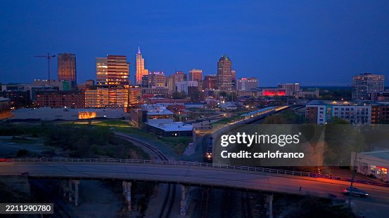 Train - Raleigh Skyline - Union Train Station - Boylan Bridge - Downtown - North Carolina - Sun Set Drone Train - Raleigh Skyline - Union Train Station - Boylan Bridge - Downtown - North Carolina - Sun Set Drone