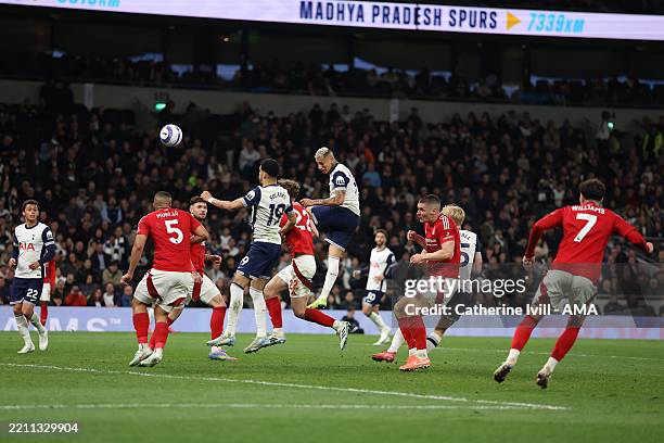 Richarlison of Tottenham Hotspur scores their first goal during the Premier League match between Tottenham Hotspur FC and Nottingham Forest FC at...