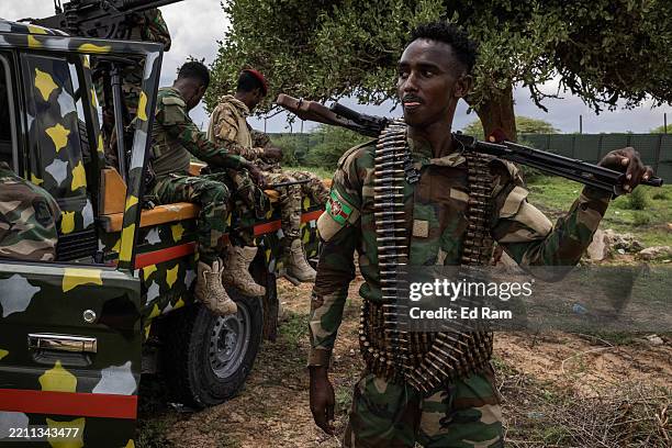 Soldiers from the Somali National Army are seen in Hiilweyne training institute, a military base north of Mogadishu, on April 21, 2025 in Mogadishu,...