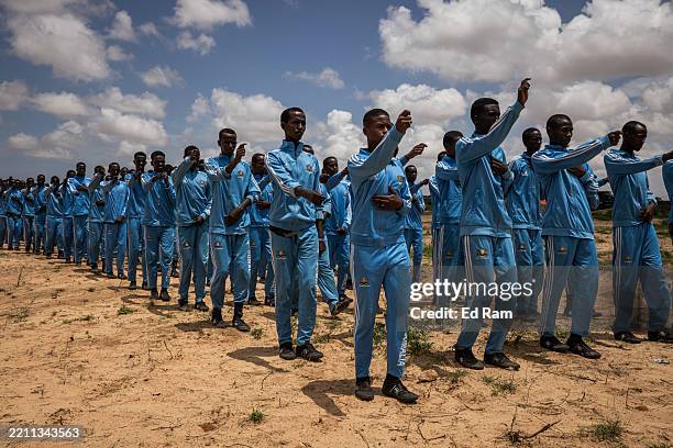 Somali National Army trainee soldiers take part in military drills in Hiilweyne training institute in a military base north of Mogadishu on April 21,...