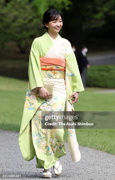 Princess Kako of Akishino walks toward guests during the spring garden party at the Akasaka Imperial Garden on April 22, 2025 in Tokyo, Japan.