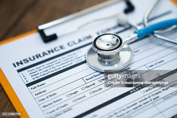 health insurance - krankenversicherung stock-fotos und bilder