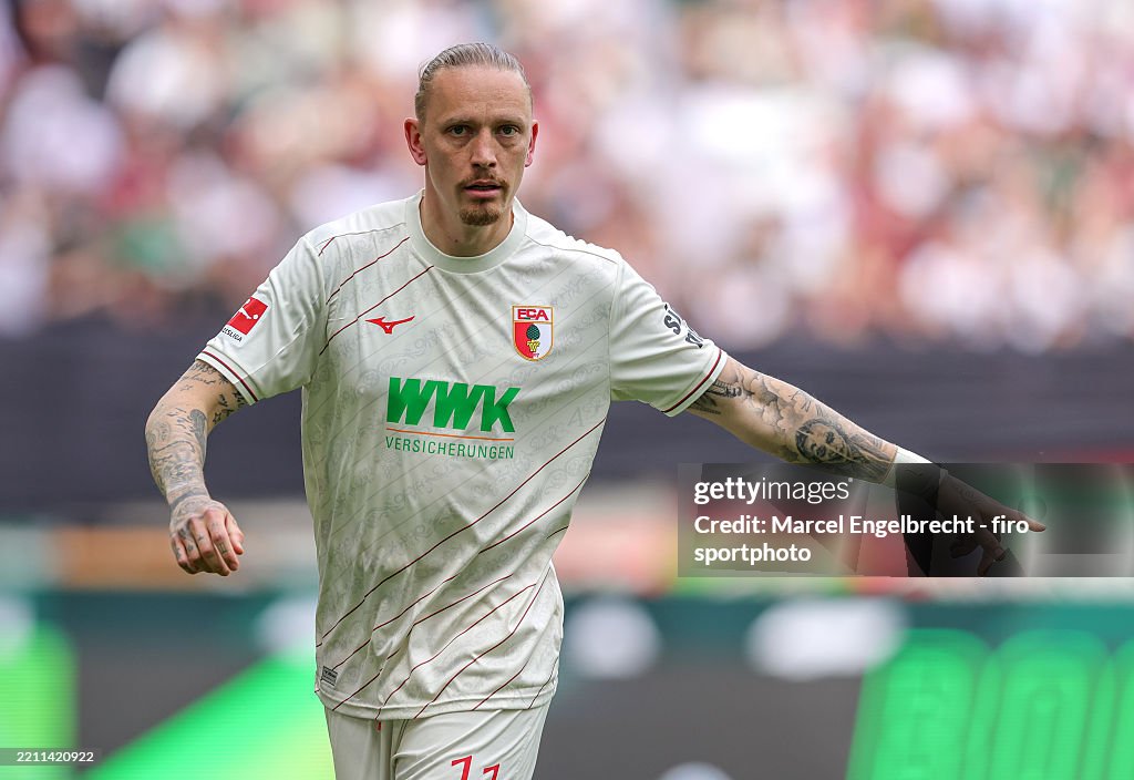 Mwolf Marius Wolf of FC Augsburg gestures during the Bundesliga match... News ...