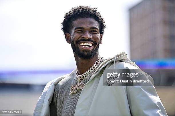 Former Colorado Buffaloes quarterback Shedeur Sanders looks on during a ceremony to retire his jersey before the Black and Gold Spring Game at Folsom...