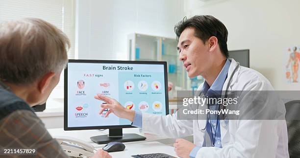 doctor explains stroke risks - blood flow stock pictures, royalty-free photos & images